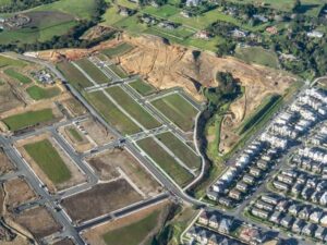 Topographic survey map guiding residential community design with roads, lots, slopes, and drainage areas.